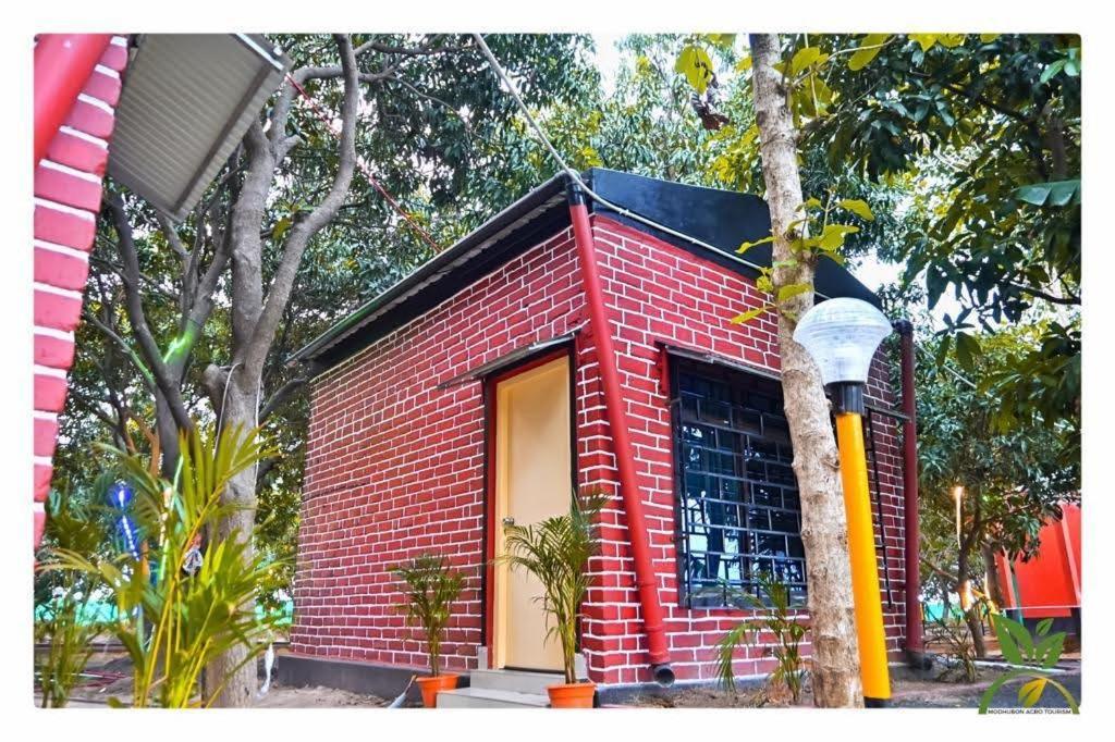 Modhubon Agro Tourism Hotell Bolpur Exteriör bild